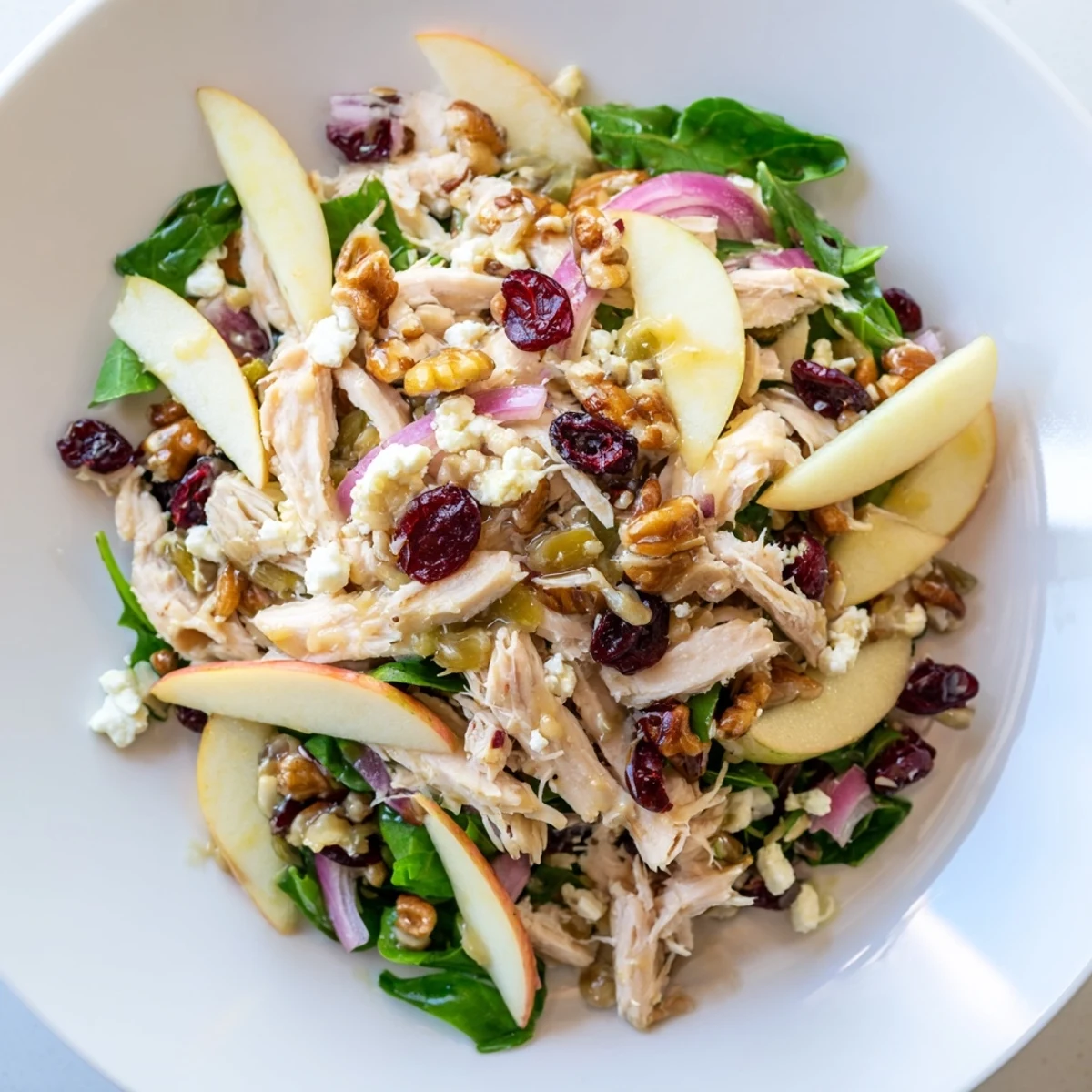 Fresh Chicken and Apple Winter Salad: a visual delight featuring bright apples and a tangy vinaigrette.