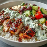 Colorful Greek chicken bowls bursting with Mediterranean flavors, perfect for lunch.
