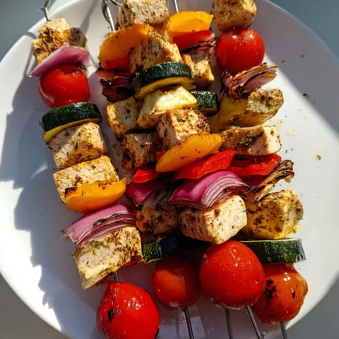 Vibrant Chicken and Veggie Skewers with juicy chicken and bright bell peppers, ready to serve and enjoy.