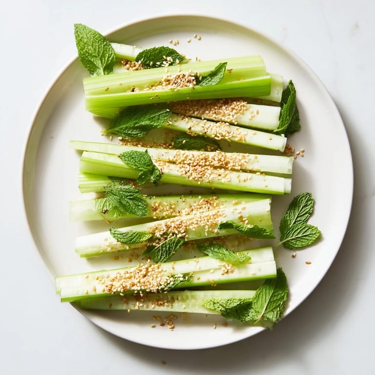 Elegant The Bamboo Zen appetizer features refreshing cucumber and celery sticks ready to serve.